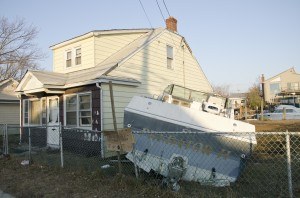 Seaford, N.Y., Nov. 11, 2012 -- Hurricane Sandy deposited this boat in a resident's back yard. Howard Greenblatt/FEMA 
