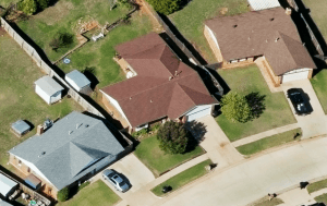 A close-up view of a residential property. Using high-resolution aerial imager, insurance professionals can gain unprecedented insight on structures to improve the claims-handling process. Photo: Xactware