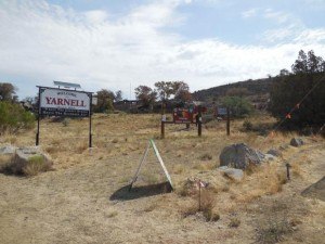 A set of three memorial boards dedicated to the 19 fallen Granite Mountain Hotshots has been posted at the Granite Mountain Hotshots Memorial Overlook, established adjacent to Hwy 89 in Yarnell. Credit: SWIMT