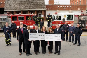 left to right: Steven Leardini, Andre Youngblood, Fire Chief Rich Gallaga of Summit Fire Department, Gina Wachtel, Leslie Rippley and Fire Chief Terence Hughes of Dolton Fire Department celebrate 2 million dollar milestone! (Photo: Business Wire)