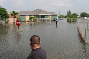 Hildalgo County, Texas, July 30, 2008 -- Eight days following Hurricane Dolly's landfall, residents were still cut off by flood waters and had to wade through water to reach passable roads. Parts of Hildalgo County are still surrounded by flood water three weeks into this disaster. Photo by Patricia Brach/FEMA 