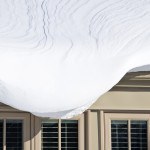 Snow Hanging Over Windows