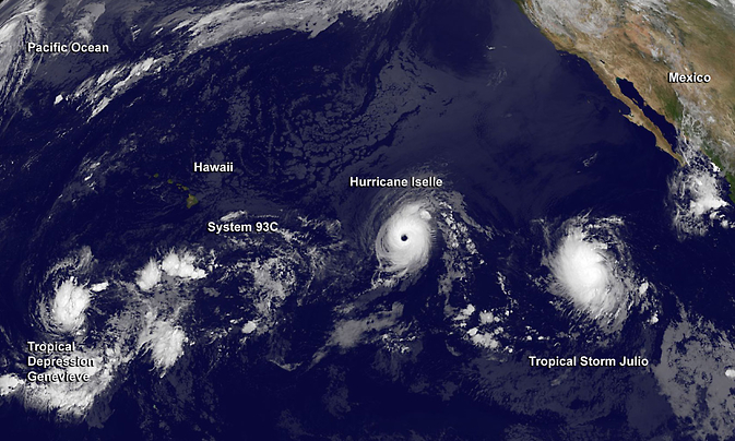 NOAA's GOES-West satellite captured this image of a very active Eastern and Central Pacific, hosting three tropical cyclones (from left to right) Genevieve, Iselle and Julio. Image Credit:  NASA/NOAA GOES Project 