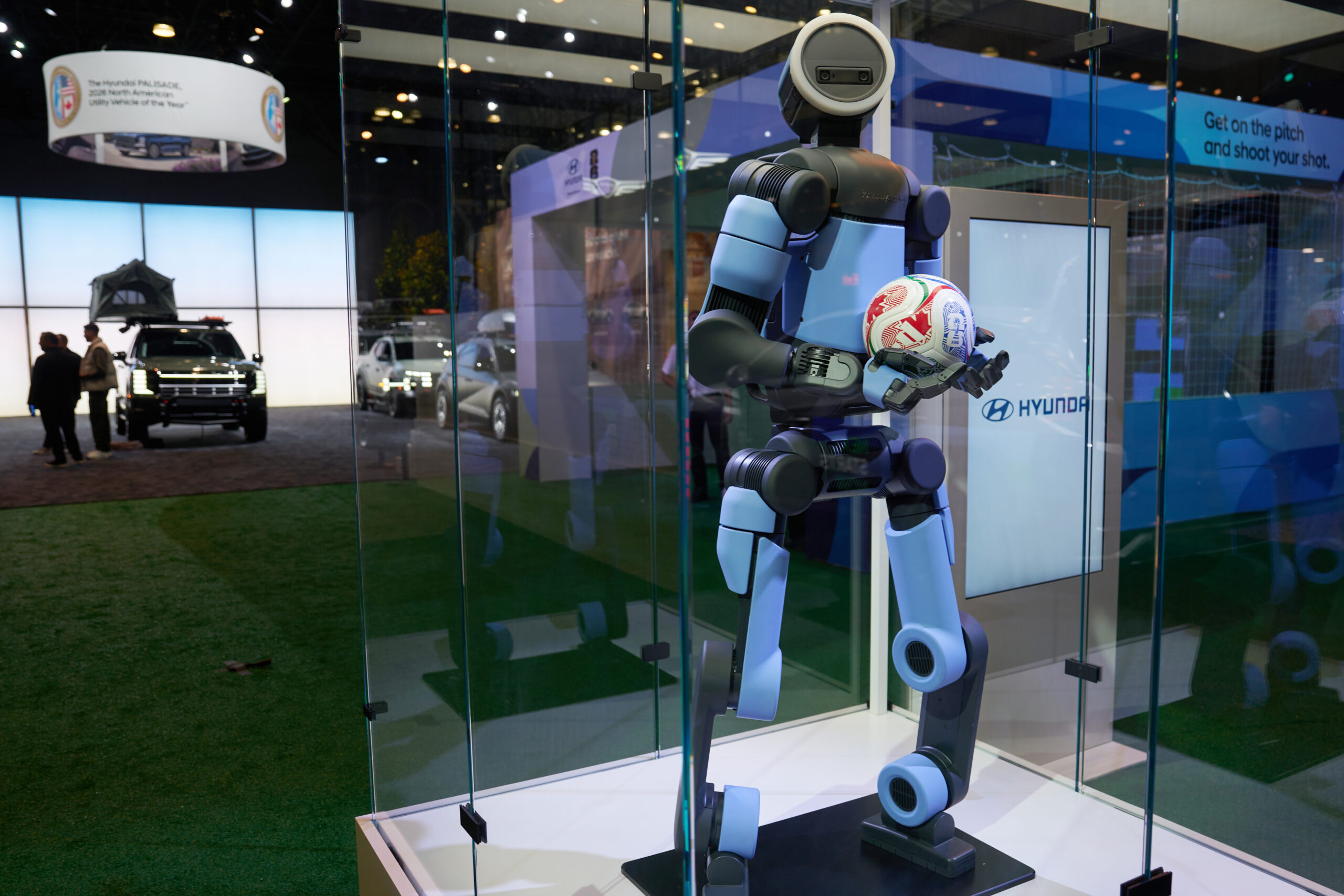 Kia Plans Robot Use, Debuts Software Car and Truck